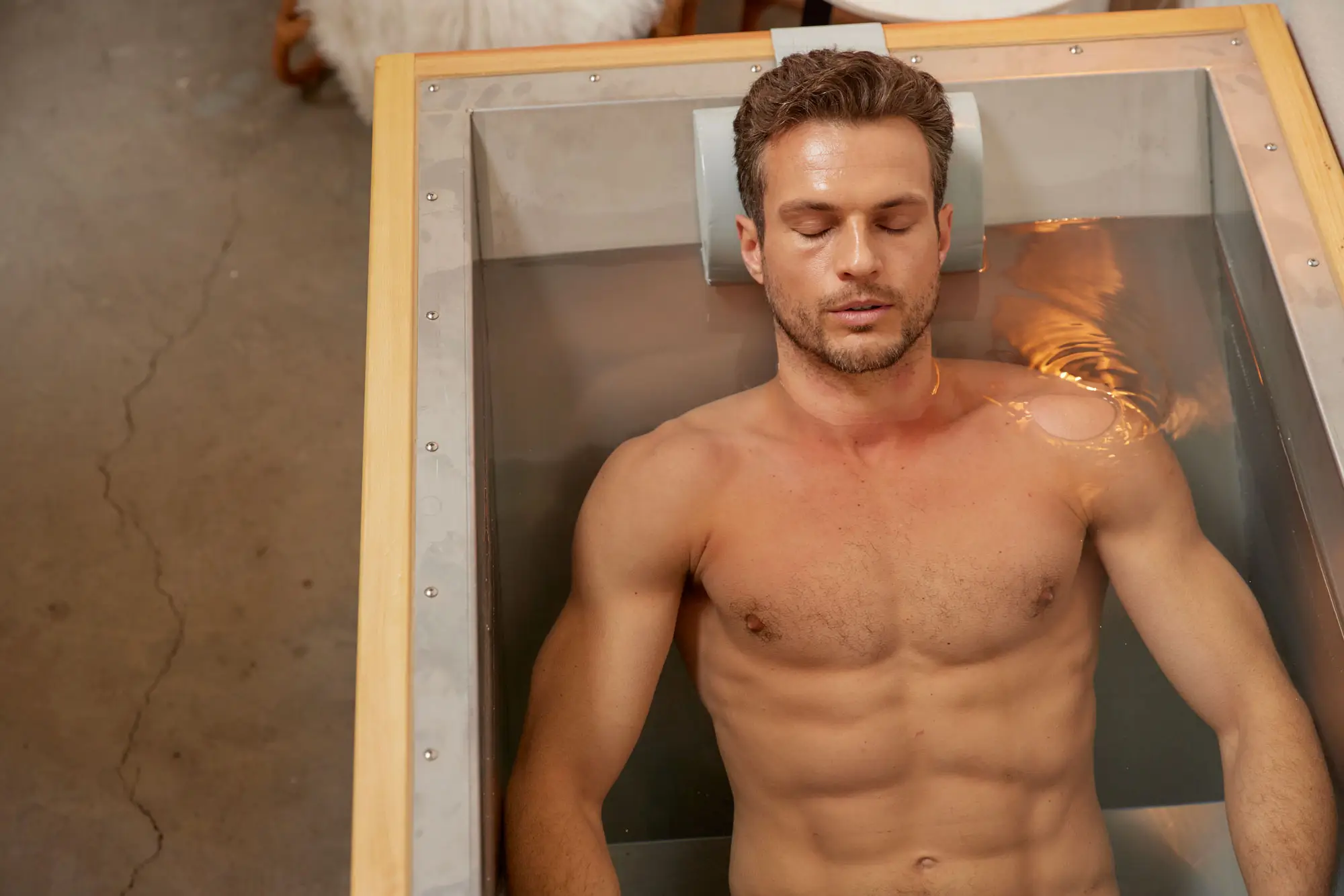 Client experiencing guided cold-plunging therapy at WORTHY Self-Care in Berkeley